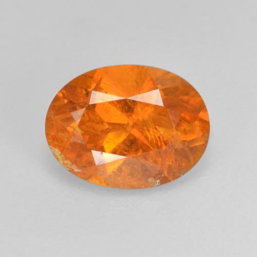 1.33 ct Orange Clinohumite Gemstone, Clinohumite Gem in Oval Facet Shape for Sale.