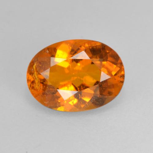 0.82 ct Orange Clinohumite Gemstone, Clinohumite Gem in Oval Facet Shape for Sale.