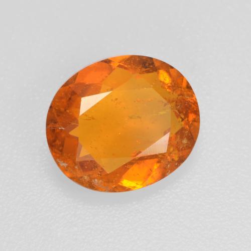 1.45 ct Orange Clinohumite Stone, Natural Clinohumite in Oval Facet Shape for Sale
