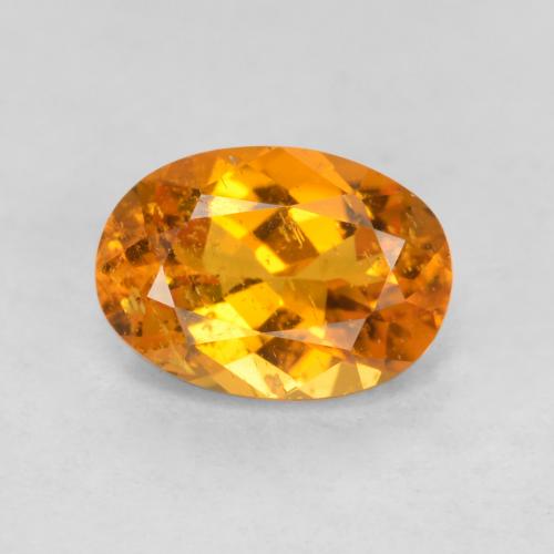 0.85 ct Orange Clinohumite Gemstone, Clinohumite Gem in Oval Facet Shape for Sale.