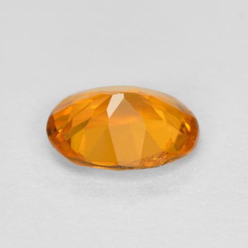 Clinohumite Gemstone in 6.6 x 5.2 mm Size for Sale, Clinohumite Stone in Medium Orange Color