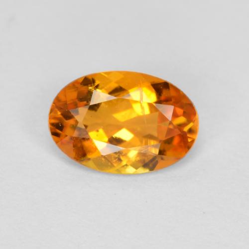 0.43 ct Orange Clinohumite Gemstone, Clinohumite Gem in Oval Facet Shape for Sale.