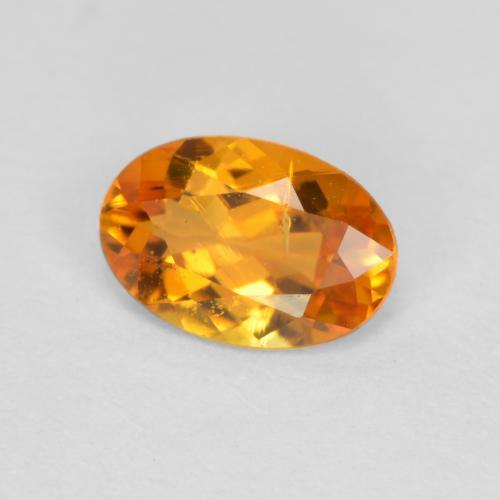 0.43 ct Orange Clinohumite Stone, Natural Clinohumite in Oval Facet Shape for Sale