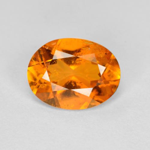 1.18 ct Orange Clinohumite Gemstone, Clinohumite Gem in Oval Facet Shape for Sale.