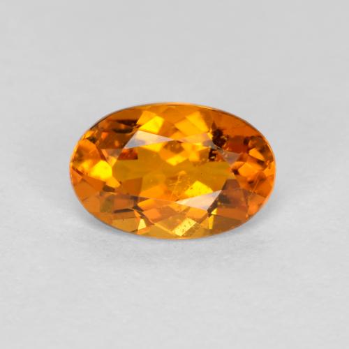 0.41 ct Orange Clinohumite Gemstone, Clinohumite Gem in Oval Facet Shape for Sale.