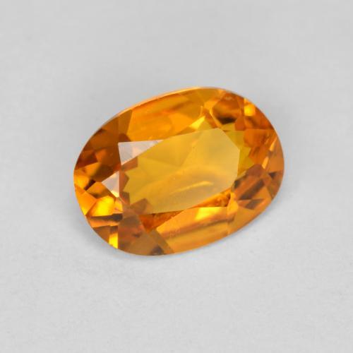 0.41 ct Orange Clinohumite Stone, Natural Clinohumite in Oval Facet Shape for Sale