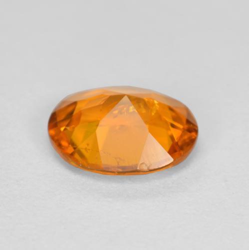 Clinohumite Gemstone in 6.1 x 4.9 mm Size for Sale, Clinohumite Stone in Apricot Orange Color
