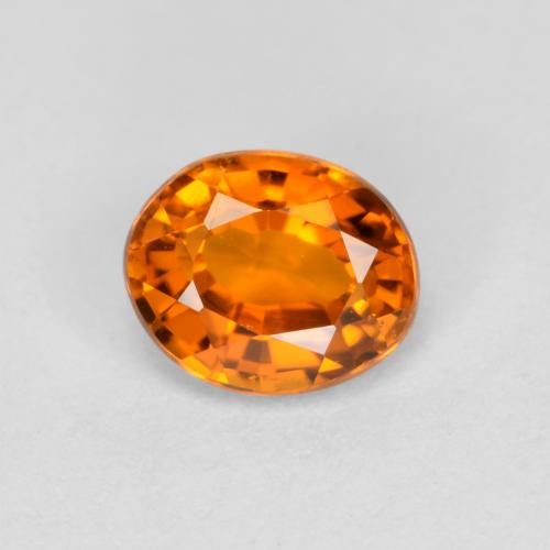 0.38 ct Orange Clinohumite Gemstone, Clinohumite Gem in Oval Facet Shape for Sale.