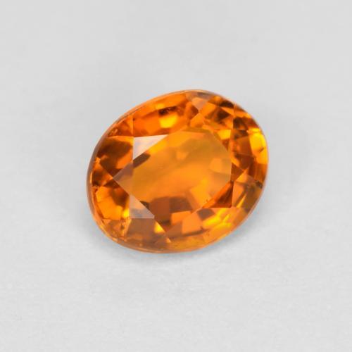 0.38 ct Orange Clinohumite Stone, Natural Clinohumite in Oval Facet Shape for Sale