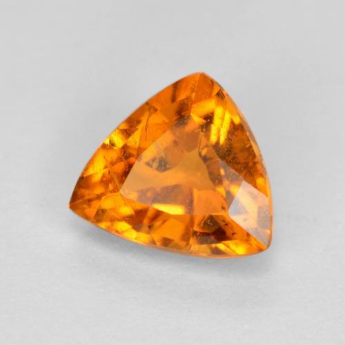 0.87 ct Orange Clinohumite Stone, Natural Clinohumite in Trillion Facet Shape for Sale