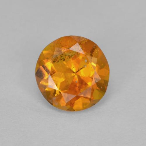 0.63 ct Orange Clinohumite Gemstone, Clinohumite Gem in Round Facet Shape for Sale.