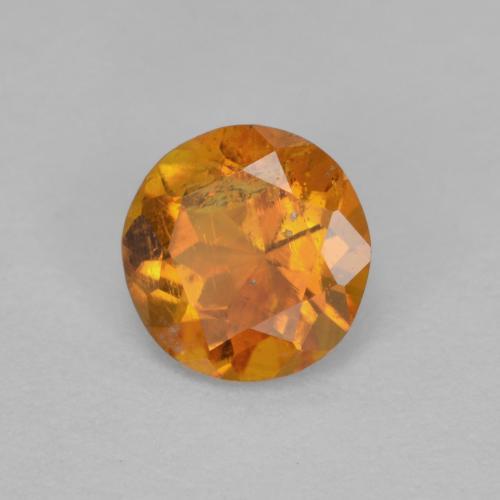 0.63 ct Orange Clinohumite Stone, Natural Clinohumite in Round Facet Shape for Sale