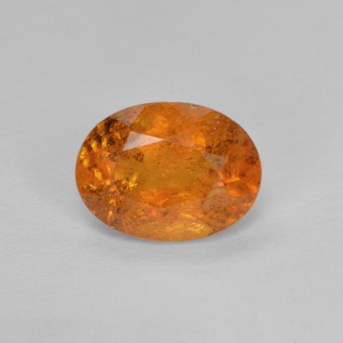 Medium-Dark Orange Klinohumit Edelstein - 1.2ct Oval facettiert (ID: 604653)