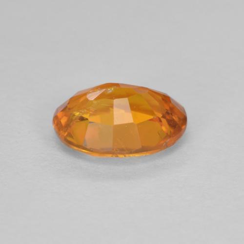 Clinohumite Gemstone in 6.9 x 5.6 mm Size for Sale, Clinohumite Stone in Medium Orange Color