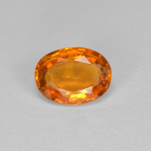 0.81 ct Orange Clinohumite Gemstone, Clinohumite Gem in Oval Facet Shape for Sale.