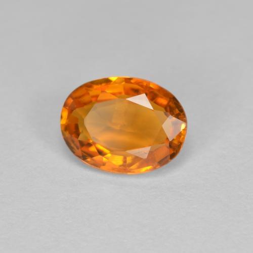 0.81 ct Orange Clinohumite Stone, Natural Clinohumite in Oval Facet Shape for Sale