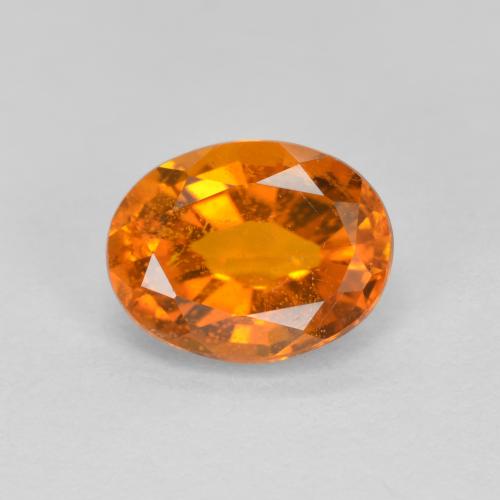 1.38 ct Orange Clinohumite Gemstone, Clinohumite Gem in Oval Facet Shape for Sale.