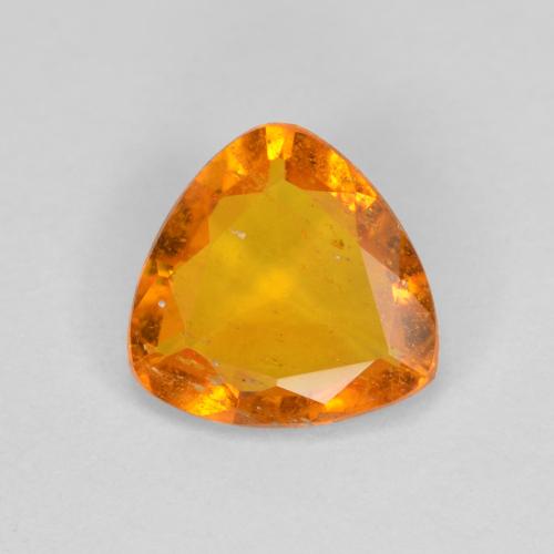 Amber Orange Klinohumit Edelstein - 0.8ct Trillantschliff (ID: 605015)