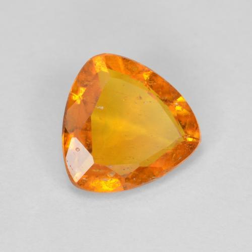 0.83 ct Orange Clinohumite Stone, Natural Clinohumite in Trillion Facet Shape for Sale