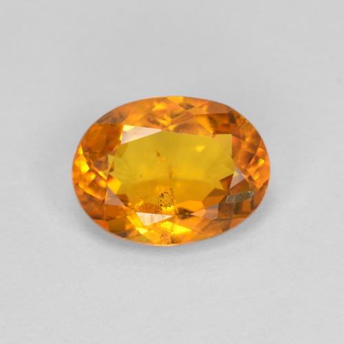 Amber Orange Klinohumit Edelstein - 1.1ct Oval facettiert (ID: 605016)