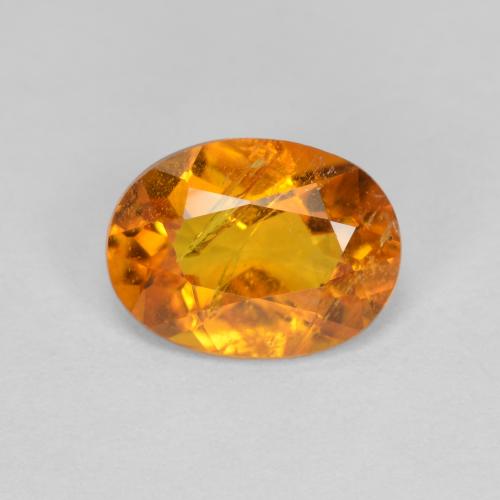 1.26 ct Orange Clinohumite Gemstone, Clinohumite Gem in Oval Facet Shape for Sale.