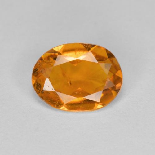 Aprikose Orange Klinohumit Edelstein - 1.2ct Oval facettiert (ID: 606572)