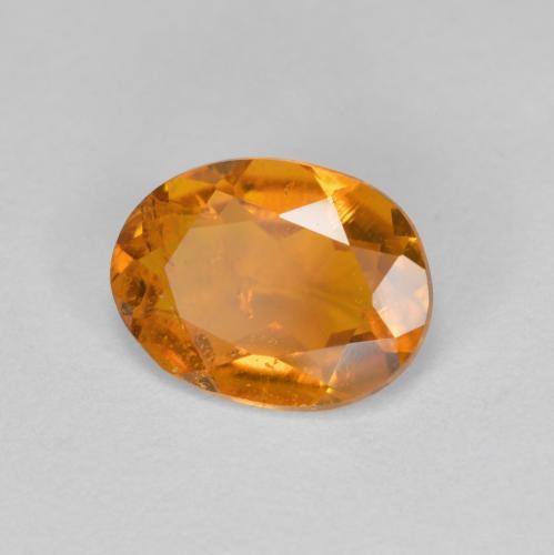 1.20 ct Orange Clinohumite Stone, Natural Clinohumite in Oval Facet Shape for Sale