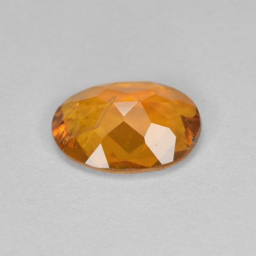 Clinohumite Gemstone in 8.4 x 6.3 mm Size for Sale, Clinohumite Stone in Apricot Orange Color