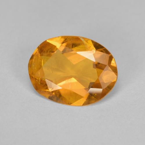 1.33 ct Orange Clinohumite Stone, Natural Clinohumite in Oval Facet Shape for Sale