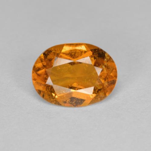 1.21 ct Orange Clinohumite Gemstone, Clinohumite Gem in Oval Facet Shape for Sale.