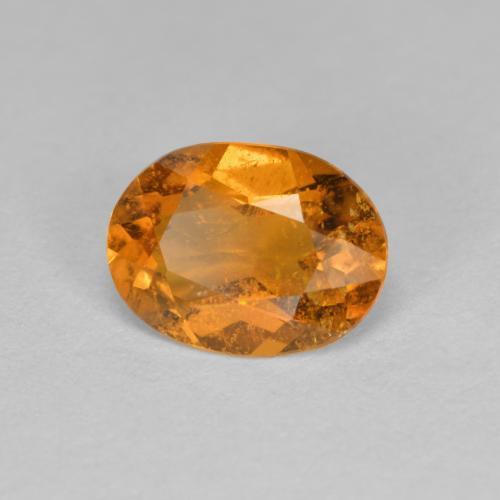1.21 ct Orange Clinohumite Stone, Natural Clinohumite in Oval Facet Shape for Sale