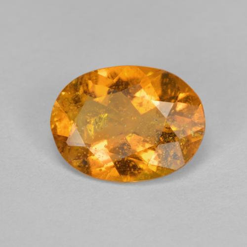 1.43 ct Orange Clinohumite Stone, Natural Clinohumite in Oval Facet Shape for Sale