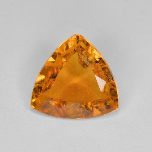 1.45 ct Orange Clinohumite Gemstone, Clinohumite Gem in Trillion Facet Shape for Sale.