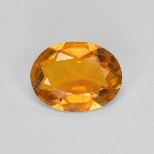 1.34 ct Orange Clinohumite Gemstone, Clinohumite Gem in Oval Facet Shape for Sale.
