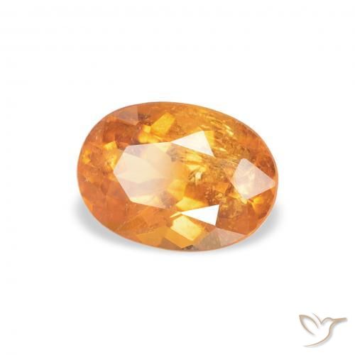 0.87 ct Orange Clinohumite Stone, Natural Clinohumite in Oval Facet Shape for Sale