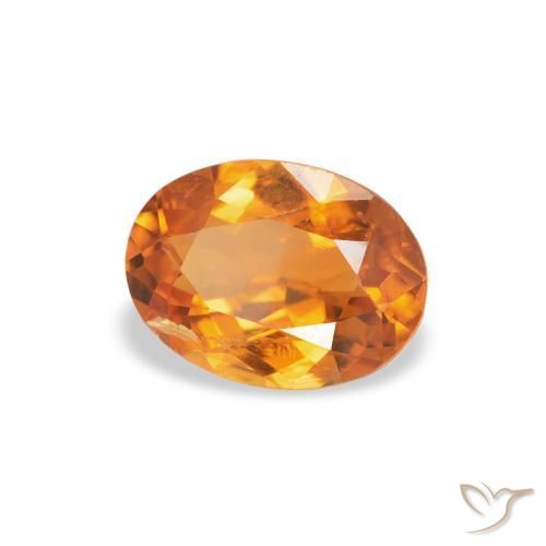 0.70 ct Orange Clinohumite Stone, Natural Clinohumite in Oval Facet Shape for Sale