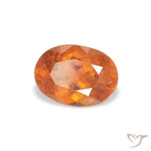 0.87 ct Orange Clinohumite Stone, Natural Clinohumite in Oval Facet Shape for Sale