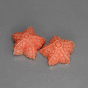 6.93 ct Pink Coral Gemstone, Coral Gem in Carved Starfish Shape for Sale.