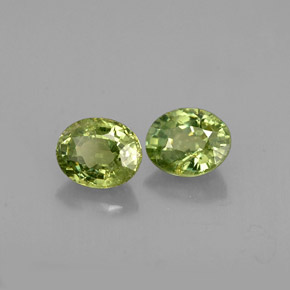 0.77 ct Green Demantoid Garnet Stone, Natural Demantoid Garnet in Oval Facet Shape for Sale