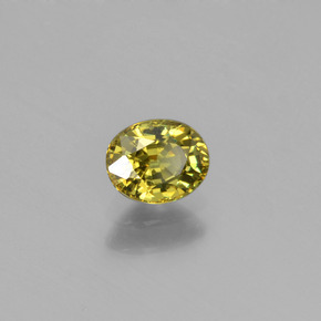 0.58 ct Green Demantoid Garnet Stone, Natural Demantoid Garnet in Oval Facet Shape for Sale