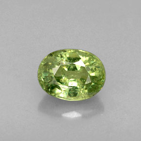 0.79 ct Green Demantoid Garnet Gemstone, Demantoid Garnet Gem in Oval Facet Shape for Sale.
