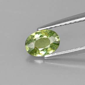 0.54 ct Green Demantoid Garnet Gemstone, Demantoid Garnet Gem in Oval Facet Shape for Sale.