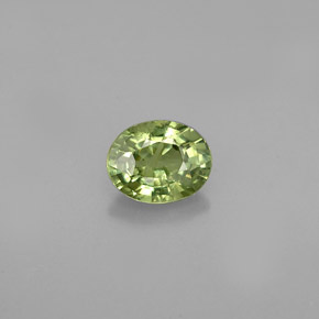 0.66 ct Green Demantoid Garnet Gemstone, Demantoid Garnet Gem in Oval Facet Shape for Sale.
