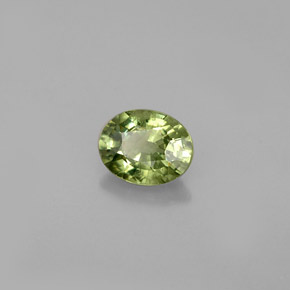 0.66 ct Green Demantoid Garnet Stone, Natural Demantoid Garnet in Oval Facet Shape for Sale