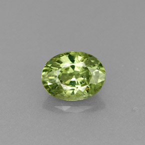 0.54 ct Green Demantoid Garnet Gemstone, Demantoid Garnet Gem in Oval Facet Shape for Sale.