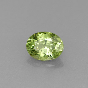 0.54 ct Green Demantoid Garnet Stone, Natural Demantoid Garnet in Oval Facet Shape for Sale