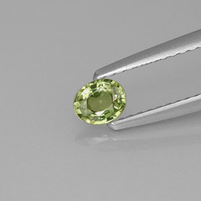 0.28 ct Green Demantoid Garnet Gemstone, Demantoid Garnet Gem in Oval Facet Shape for Sale.