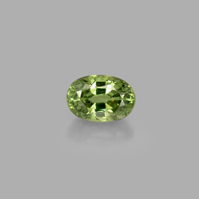 0.72 ct Green Demantoid Garnet Gemstone, Demantoid Garnet Gem in Oval Facet Shape for Sale.