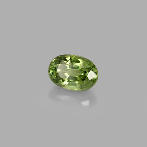 0.72 ct Green Demantoid Garnet Stone, Natural Demantoid Garnet in Oval Facet Shape for Sale