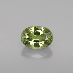 0.77 ct Green Demantoid Garnet Gemstone, Demantoid Garnet Gem in Oval Facet Shape for Sale.